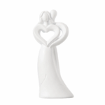 Keramieken beeldje van twee abstracte figuren die samen een hart vormen – symbool voor liefde en verbondenheid