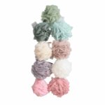 Verzameling SoHo badsponsen in diverse pasteltinten, geschikt voor dagelijks gebruik en huidverzorging.