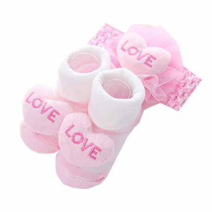 Baby sokjes met bijpassende roze haarband met bloem