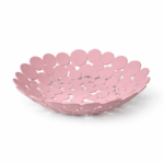 Roze plastic fruitschaal met open cirkeldesign op witte achtergrond