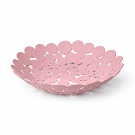 Roze plastic fruitschaal met open cirkeldesign op witte achtergrond