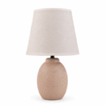 Keramische schemerlamp met stijlvolle voet en warme sfeerverlichting op witte achtergrond.